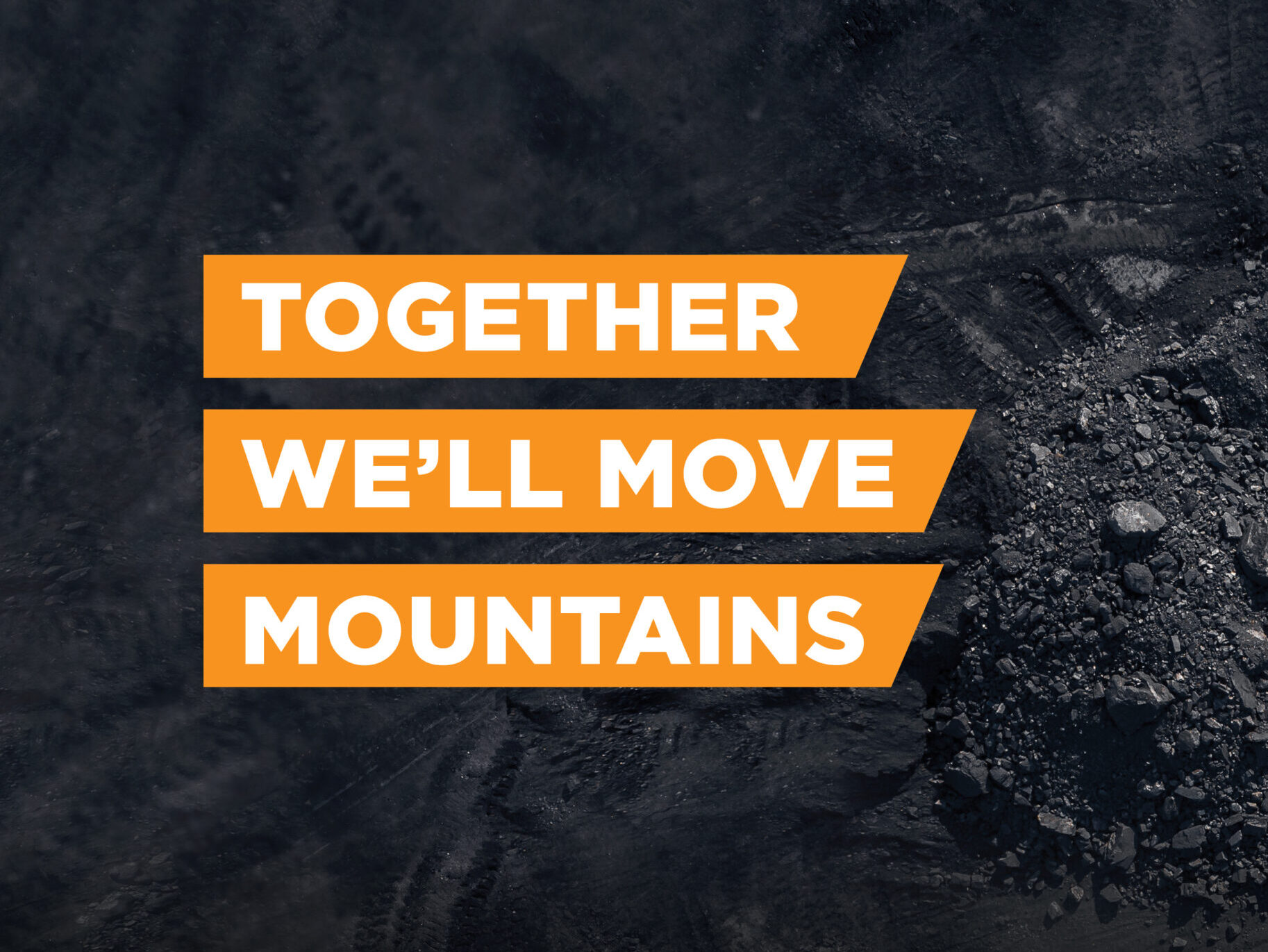 White text on orange background with background of dark rubble