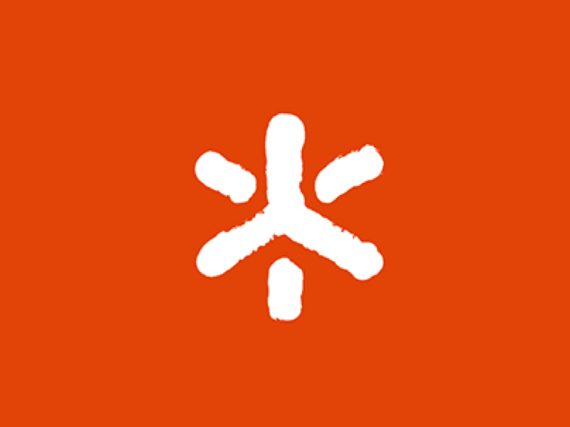 White asterisk on orange background